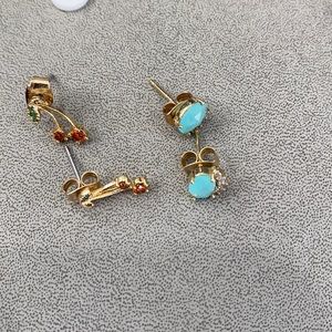 Two sets of gold color Earrings